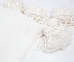 Amity home zion quilt in ivory   chunky tasseled edge