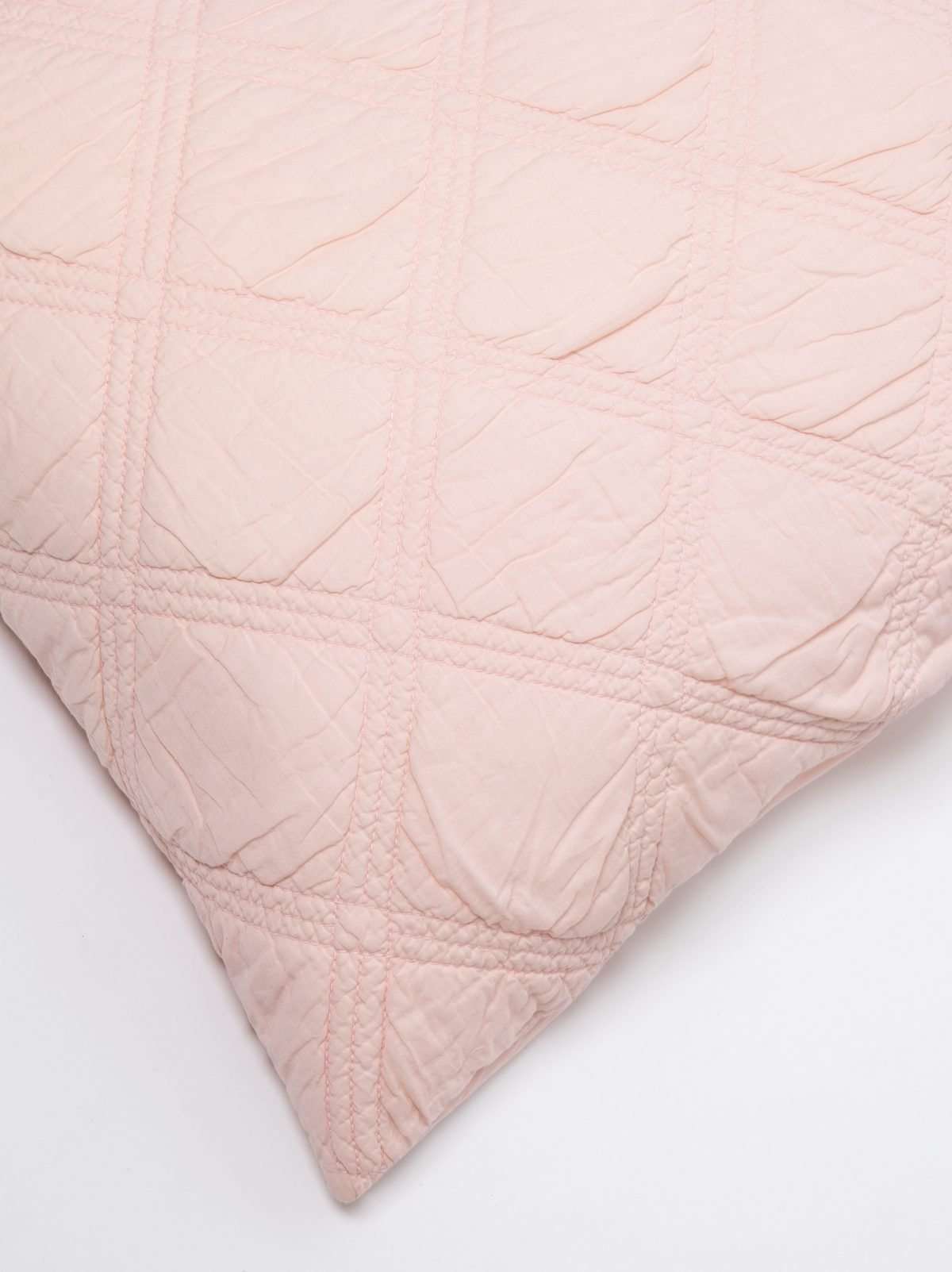 Amity home kinsley quilt in petal pink   textured grid quilting