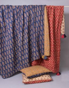 Amity home mira quilt in claret   reversible block print design