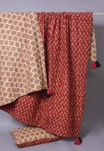 Amity home mira quilt in claret   reversible block print design