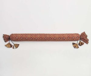 Amity home ayla pencil bolster in claret patterned   decorative tassels