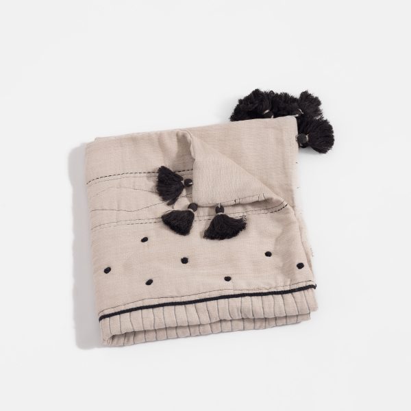 Amity home sitka quilt in natural with black   tassels  embroidered dots