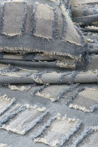 Amity home hamilton coverlet in blue   frayed patchwork texture