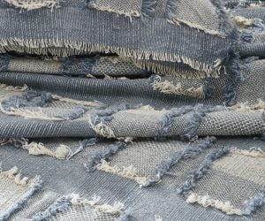 Amity home hamilton coverlet in blue   frayed patchwork texture