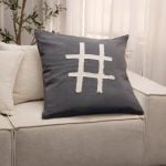 Amity home hash tag pillow in charcoal   cream tufted design