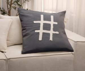 Amity home hash tag pillow in charcoal   cream tufted design