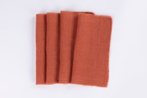 Amity home ranier linen cocktail napkin set in burnt sienna   natural linen texture