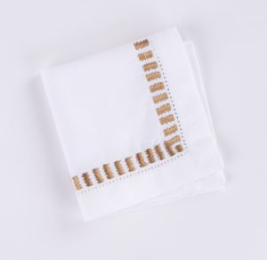 Amity home savona cocktail napkin set caramel   intricate ladder stitch detail