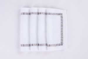 Amity home savona cocktail napkin set in white with grey embroidery   elegant border