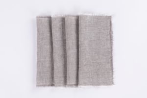 Amity home brisbane linen cocktail napkin set in grey chambray   frayed edges