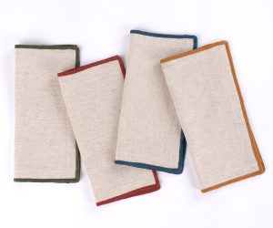 Amity home cora cocktail napkin set in natural with bold borders   linen texture