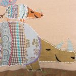 Amity home rhino pillow in multi color patchwork   appliqué rhinos design