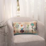Amity home benny pillow in tan plaid   colorful embroidered woodland animals