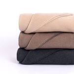 Amity home heiko super throw in camel   blanket stitch edge