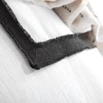 Amity home brady  fitzgerald collection in white with black   frayed edge detail