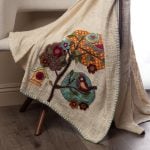 Amity home eara throw in natural   textured weave with appliqué