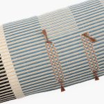Amity home mina x long bolster in adriatic blue  natural striped   decorative tassels