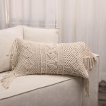 Amity home alcott long bolster pillow in natural   macrame knotting with tassels