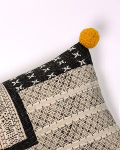 Amity home bina x long bolster in black  natural   mustard pom pom