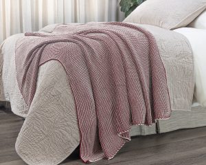Amity home cooper throw in garnet   intricate woven texture