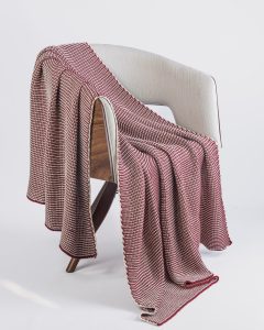 Amity home cooper throw in garnet   textured woven pattern