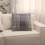 Amity home studs pillow in dark grey  cream   abstract grid pattern