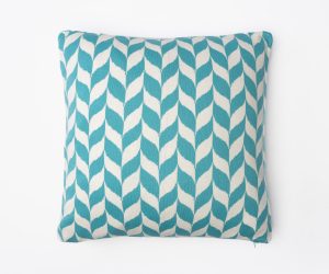 Amity home halden pillow in teal  cream   geometric knit pattern