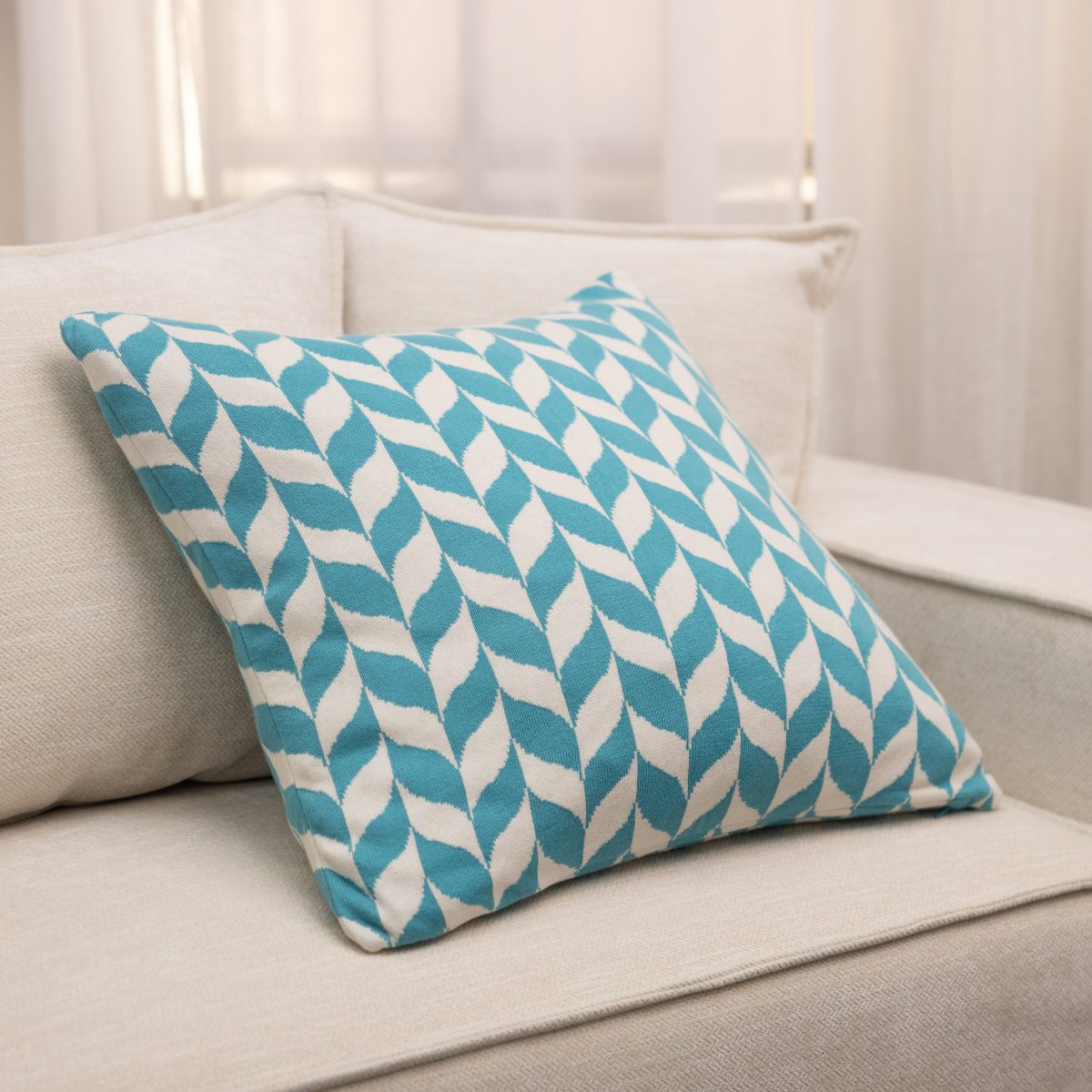 Amity home halden pillow in turquoise  cream   geometric knit pattern