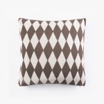 Amity home nat pillow in brown  off white   argyle knit pattern