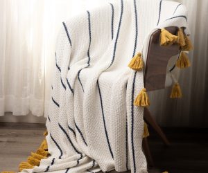 Amity home wilson throw in cream navy  mustard   striped knit with tassels