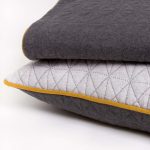 Amity home kirk knitted quilt in grey   geometric quilted design