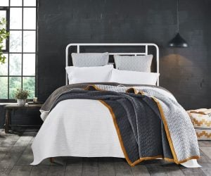 Amity home kirk knitted quilt in grey with yellow trim   diamond knit pattern
