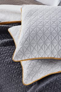 Amity home kirk knitted quilt in grey   diamond quilted pattern