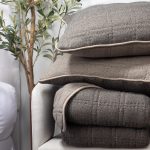 Amity home fletcher quilt in granite   textured knit with piping