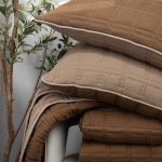 Amity home fletcher quilt in saddle   quilted grid stitching