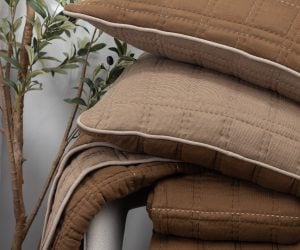 Amity home fletcher quilt in saddle   quilted grid stitching