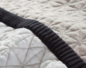 Amity home kirk  ranier collection in two tone neutrals   diamond quilted ribbed trim