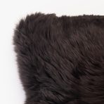 Amity home long sheepskin pillow in sable   fluffy texture