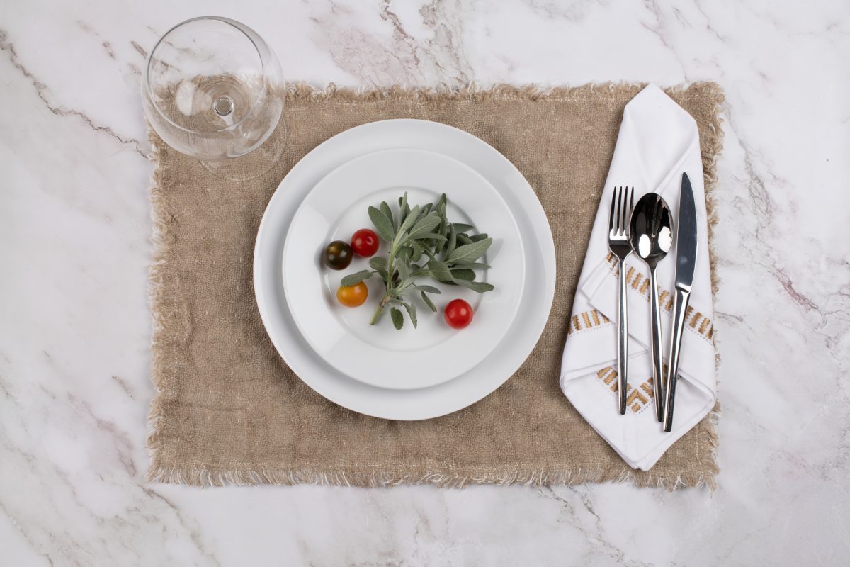 Amity home savona dinner napkin set set of 4 in caramel embroidered white   elegant pattern