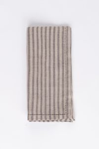 Amity home bernadette napkin in walnut brown stripe   ladder stitch detail