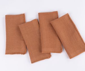 Amity home ranier linen dinner napkin set in ochre   frayed edges