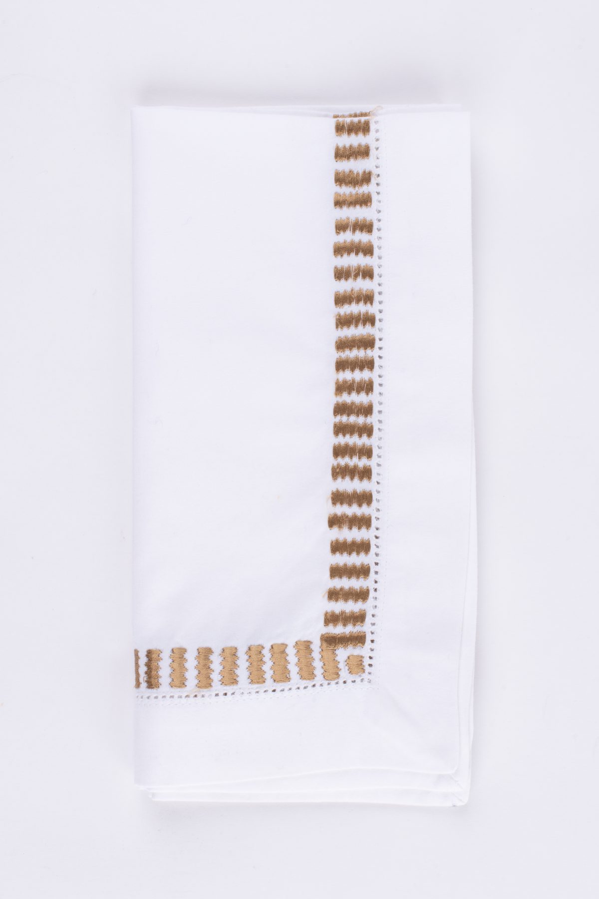 Amity home savona dinner napkin set in white with caramel   embroidered border