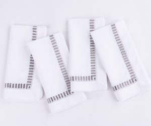 Amity home savona dinner napkin set in white with grey embroidery   elegant border design