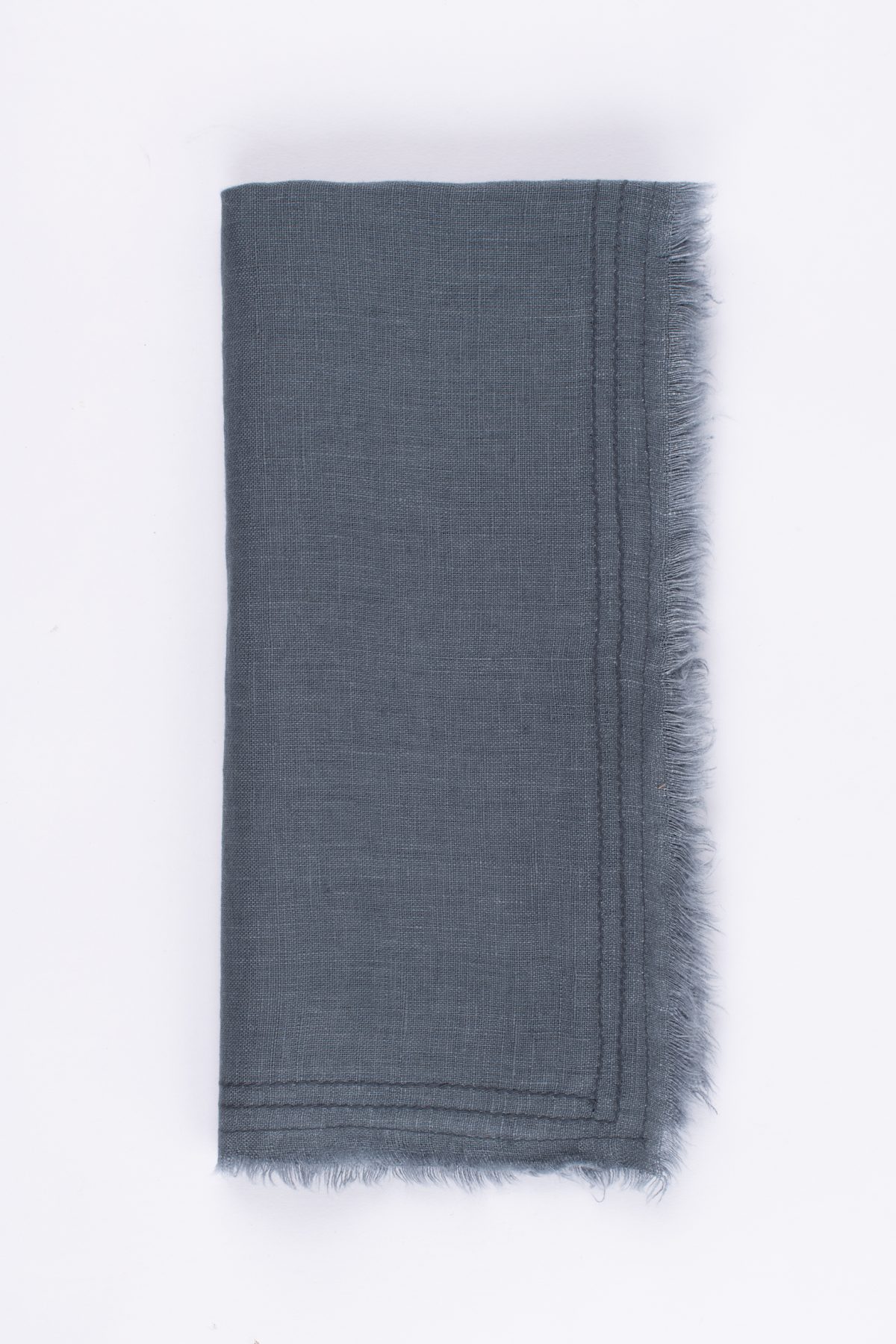 Amity home brisbane linen dinner napkin set in steel blue   frayed edges