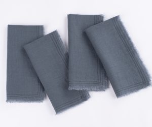 Amity home brisbane linen dinner napkin set in steel blue   frayed edges