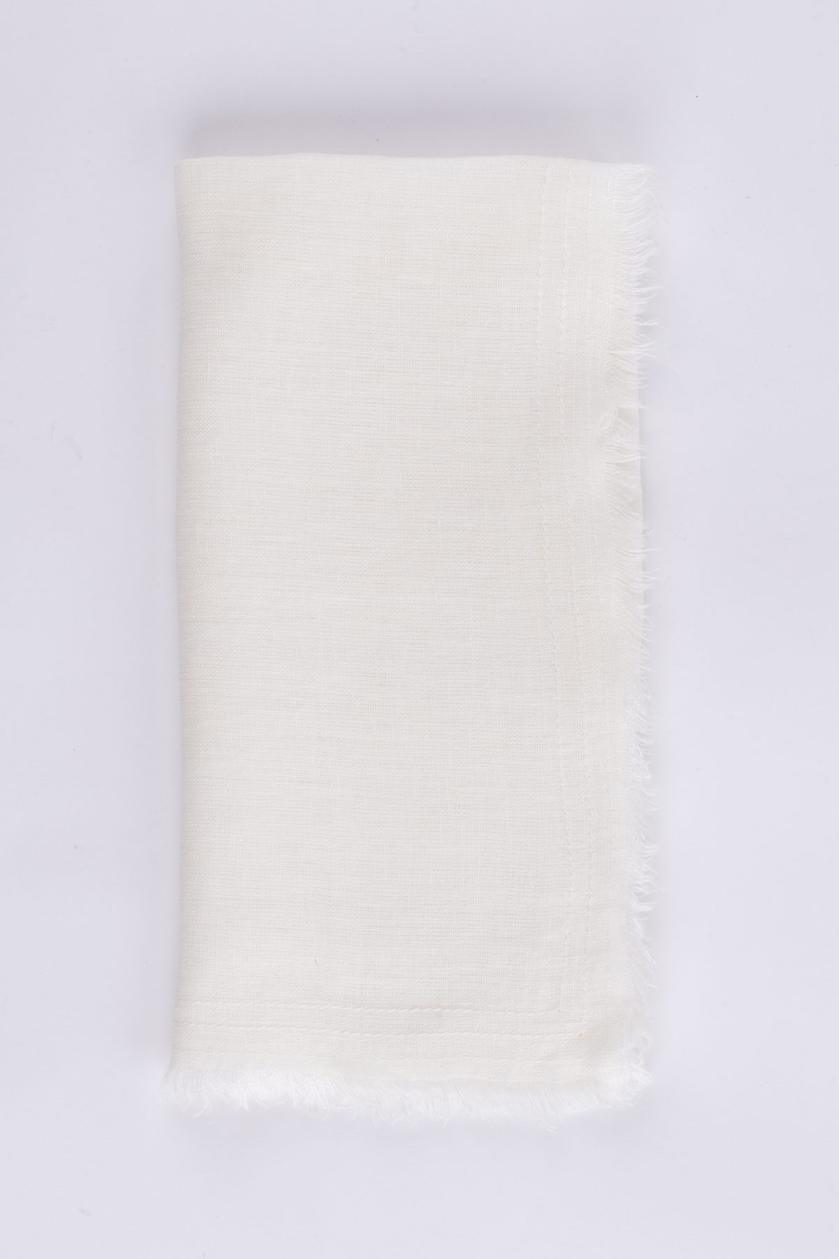 Amity home brisbane linen dinner napkin set in ivory   frayed edges