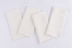 Amity home brisbane linen dinner napkin set in ivory   frayed edge linen texture