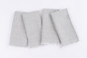 Amity home brisbane linen dinner napkin set in seaglass   frayed edges