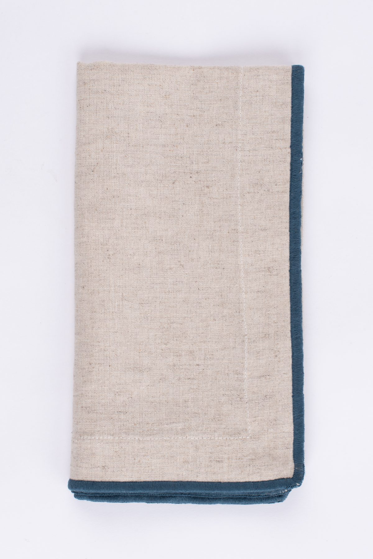 Amity home cora dinner napkin set in naturalteal   bold contrasting trim