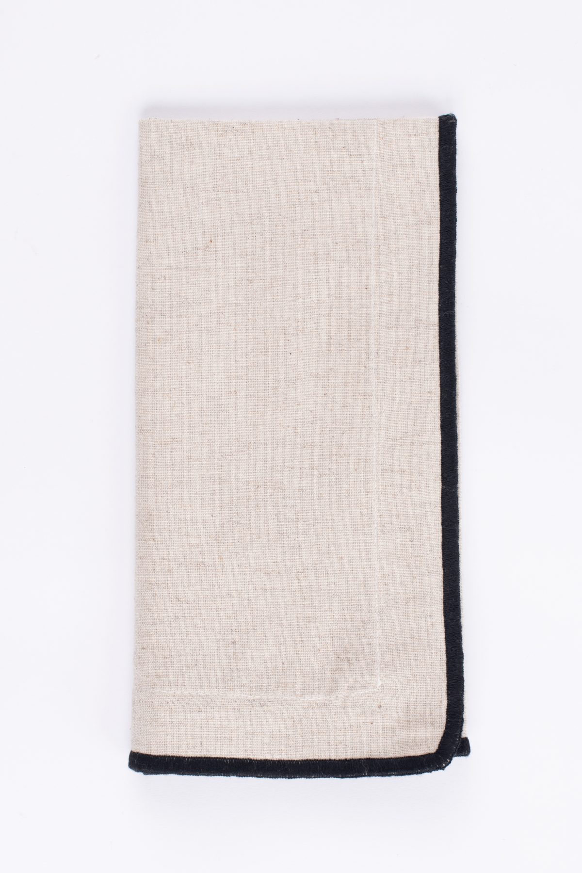 Amity home cora dinner napkin set in naturalblack   linen weave texture